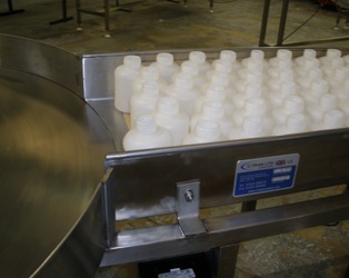plastic bottles loading on to a rotary table